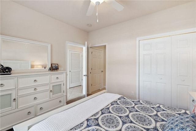 18136 Millstone Cove Rd Unit 136, Gravois Mills, MO 65037 - bedroom with a closet and a ceiling fan