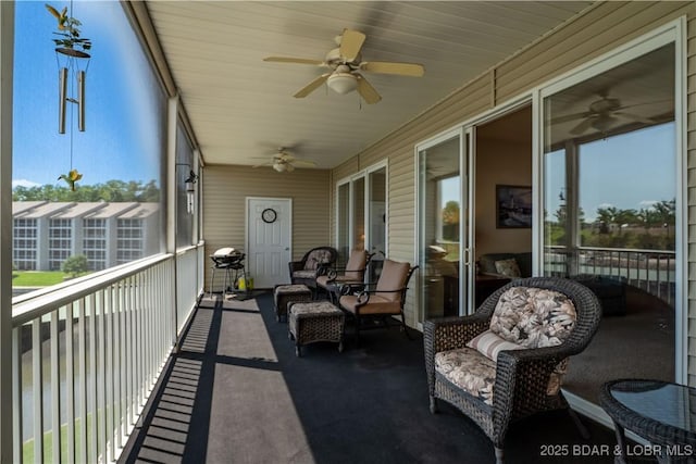 18136 Millstone Cove Rd Unit 136, Gravois Mills, MO 65037 - sunroom featuring ceiling fan