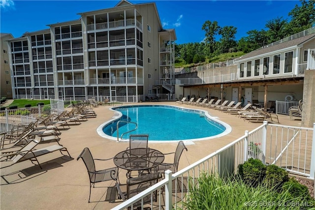 18136 Millstone Cove Rd Unit 136, Gravois Mills, MO 65037 - community pool with a patio
