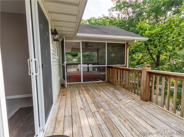 1403 Ginger Rd, Lake Ozark, MO 65049 - deck featuring a sunroom and a ceiling fan
