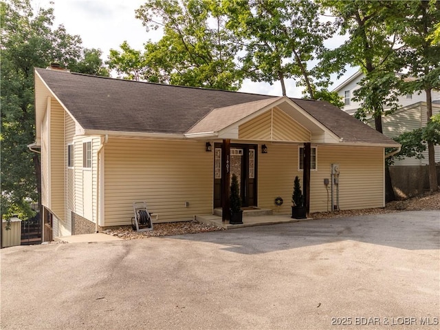 1403 Ginger Rd, Lake Ozark, MO 65049 - view of front of property featuring a shingled roof