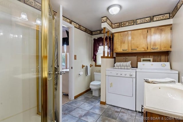 33682 Daybreak Rd, Gravois Mills, MO 65037 - full bathroom featuring washing machine and dryer, a shower stall, and vanity