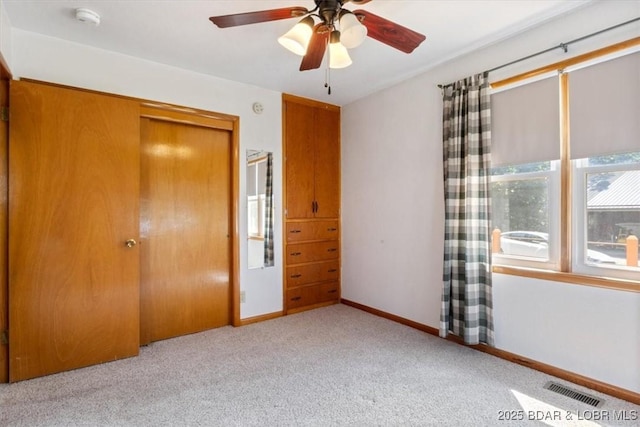 33682 Daybreak Rd, Gravois Mills, MO 65037 - unfurnished bedroom with carpet floors, a closet, and ceiling fan