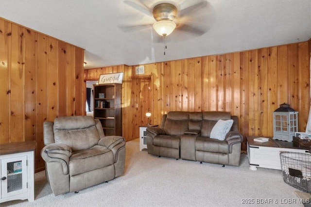 33682 Daybreak Rd, Gravois Mills, MO 65037 - carpeted living area with ceiling fan and wood walls