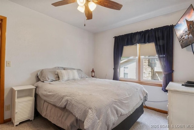 33682 Daybreak Rd, Gravois Mills, MO 65037 - bedroom with light carpet and ceiling fan