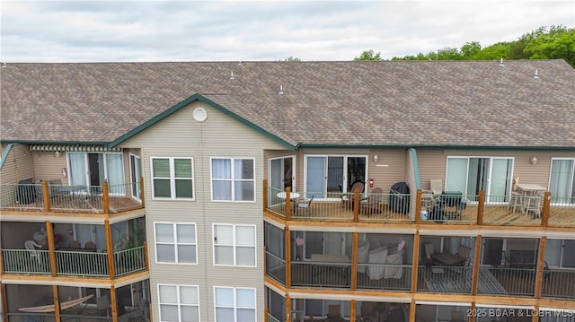 133 Cedar Glen Ct Unit 4B, Camdenton, MO 65020 - back of house with roof with shingles