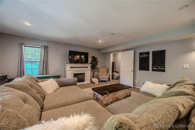1170 San Jose Dr, Osage Beach, MO 65065 - living room with carpet, a glass covered fireplace, and recessed lighting