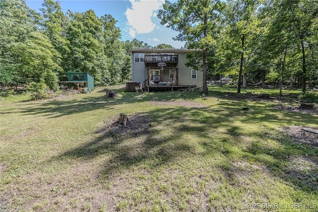 1170 San Jose Dr, Osage Beach, MO 65065 - view of grassy yard featuring an outbuilding and a deck