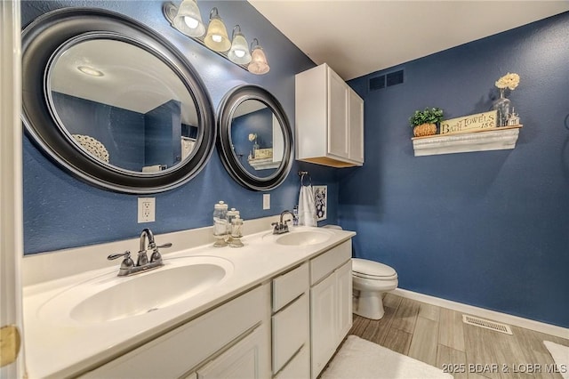 1170 San Jose Dr, Osage Beach, MO 65065 - full bath featuring toilet and double vanity