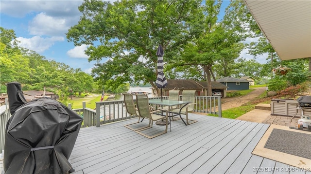 168 Moeller Way, Camdenton, MO 65020 - wooden deck with outdoor dining area