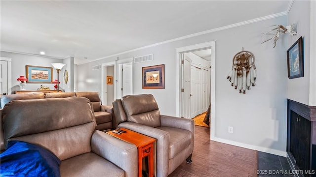 168 Moeller Way, Camdenton, MO 65020 - living room featuring crown molding, dark wood-style floors, and recessed lighting
