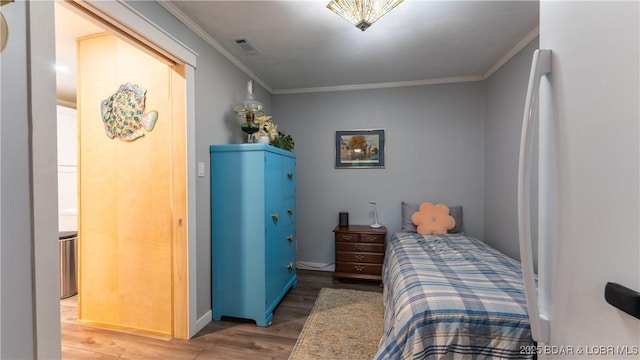 168 Moeller Way, Camdenton, MO 65020 - bedroom with ornamental molding and wood finished floors