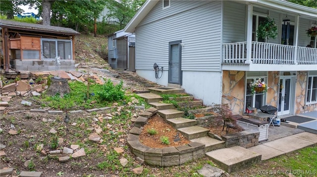 168 Moeller Way, Camdenton, MO 65020 - view of side of property with a balcony and french doors