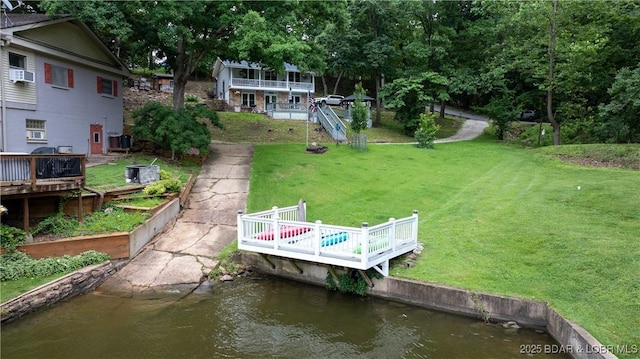 168 Moeller Way, Camdenton, MO 65020 - dock area featuring a deck with water view, a yard, and cooling unit