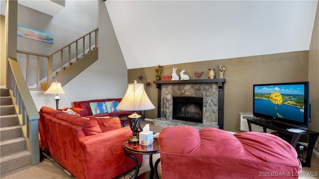 400 Hopetown Dr, Osage Beach, MO 65065 - carpeted living room with stairway and a fireplace
