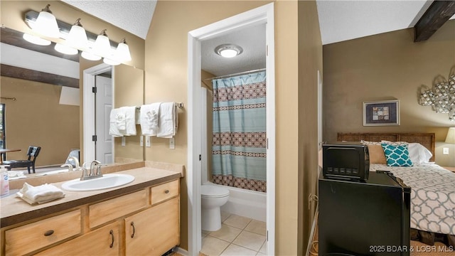 400 Hopetown Dr, Osage Beach, MO 65065 - ensuite bathroom featuring tile patterned flooring, vanity, shower / bath combination with curtain, and a textured ceiling