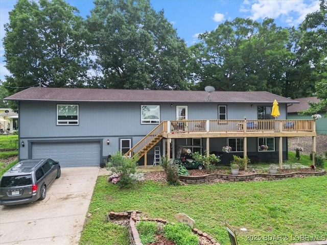 250 De Young Dr, Climax Springs, MO 65324 - view of front of property featuring concrete driveway, a garage, stairs, a front yard, and a deck