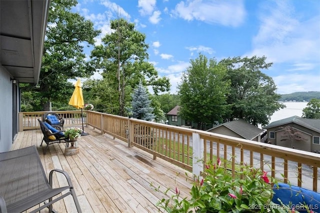 250 De Young Dr, Climax Springs, MO 65324 - wooden deck with a water view