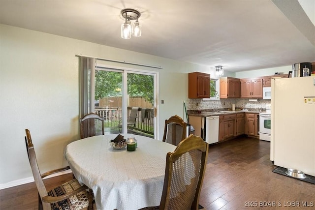 250 De Young Dr, Climax Springs, MO 65324 - dining space featuring dark wood-style flooring