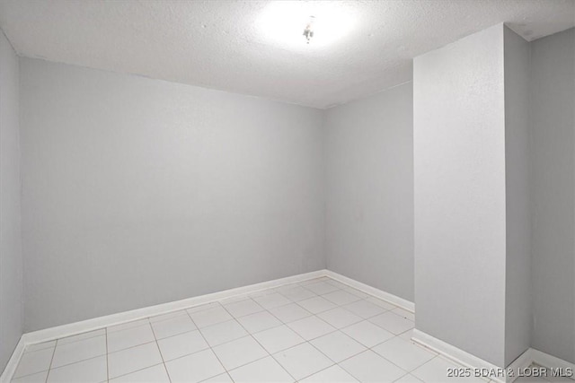250 De Young Dr, Climax Springs, MO 65324 - spare room featuring a textured ceiling and baseboards