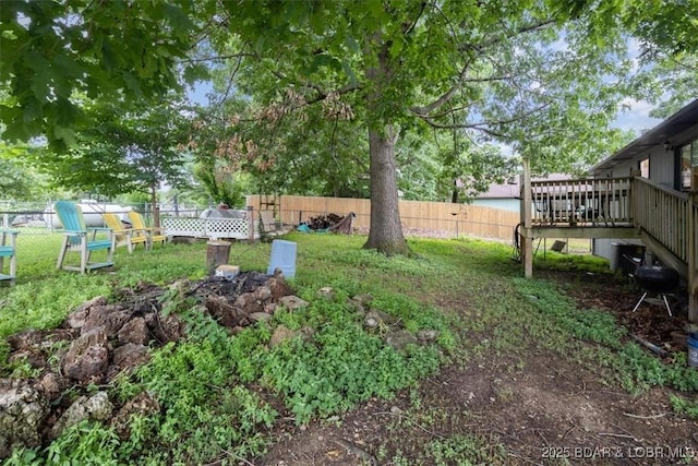 250 De Young Dr, Climax Springs, MO 65324 - fenced backyard with a deck