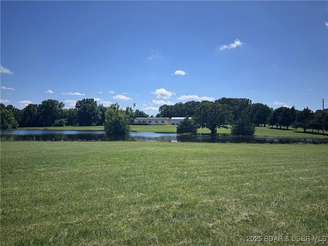 974 State Rte E, Montreal, MO 65591 - view of grassy yard featuring a water view