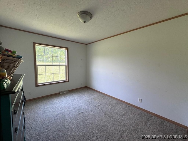 974 State Rte E, Montreal, MO 65591 - unfurnished room featuring crown molding, carpet floors, and a textured ceiling