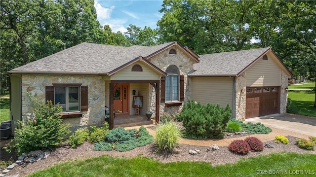 146 Palmer Dr, Lake Ozark, MO 65049 - view of front facade featuring stone siding, an attached garage, a shingled roof, and concrete driveway