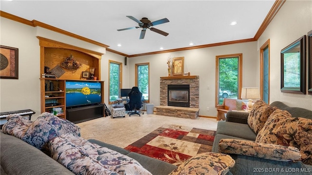 146 Palmer Dr, Lake Ozark, MO 65049 - carpeted living room with a stone fireplace, ceiling fan, plenty of natural light, crown molding, and recessed lighting
