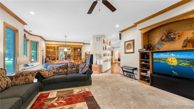 146 Palmer Dr, Lake Ozark, MO 65049 - carpeted living room with ornamental molding, a ceiling fan, and recessed lighting