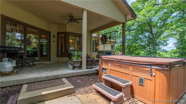 146 Palmer Dr, Lake Ozark, MO 65049 - view of patio / terrace with a hot tub and a ceiling fan