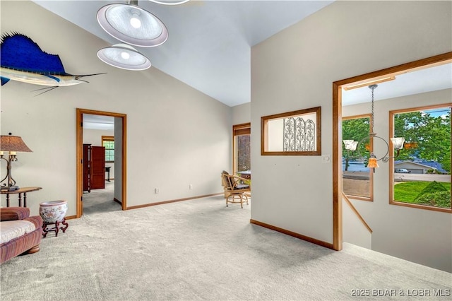 1759 Chimney Pt, Sunrise Beach, MO 65079 - interior space featuring carpet, vaulted ceiling, and an upstairs landing