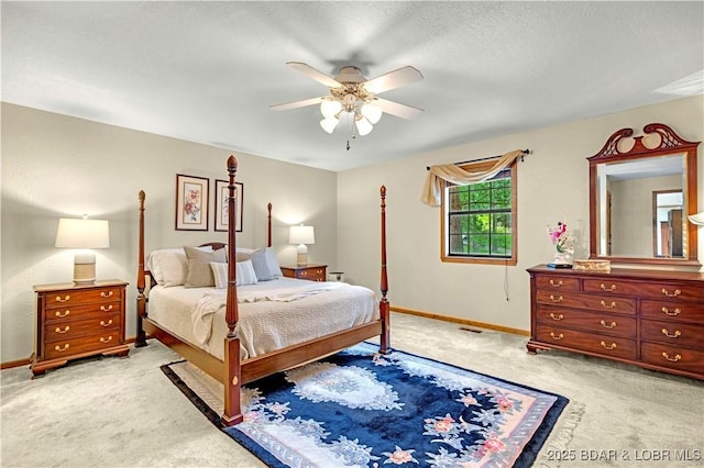 1759 Chimney Pt, Sunrise Beach, MO 65079 - bedroom with light colored carpet, a ceiling fan, and a textured ceiling