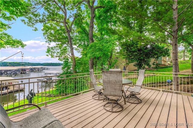1759 Chimney Pt, Sunrise Beach, MO 65079 - wooden deck with a water view and outdoor dining area