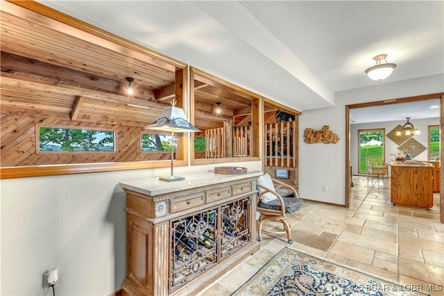 1759 Chimney Pt, Sunrise Beach, MO 65079 - interior space featuring baseboards and beamed ceiling