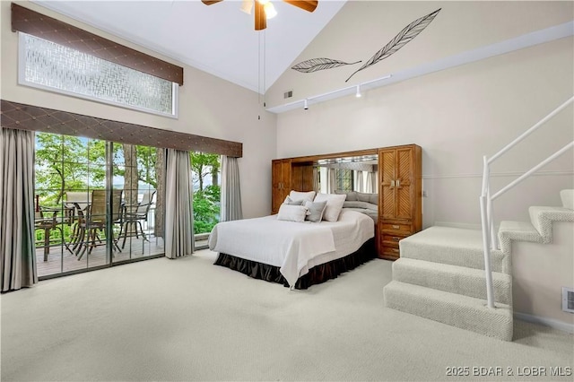 1759 Chimney Pt, Sunrise Beach, MO 65079 - carpeted bedroom featuring access to outside, high vaulted ceiling, and a ceiling fan