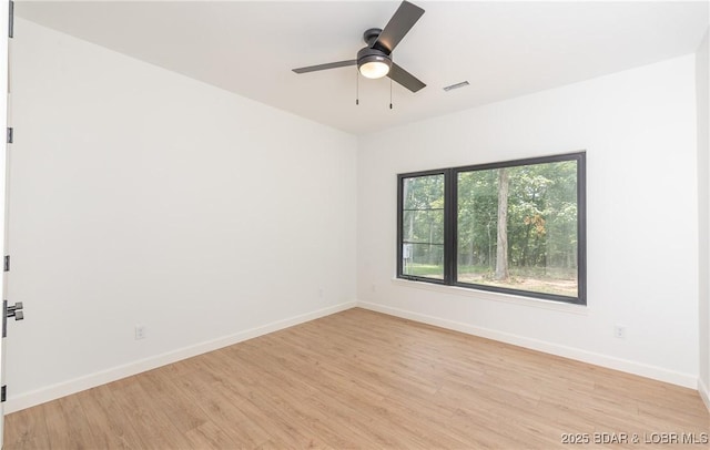 370 Via Appia Dr, Sunrise Beach, MO 65079 - empty room with light wood-type flooring and a ceiling fan