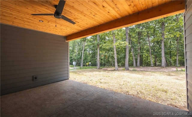 370 Via Appia Dr, Sunrise Beach, MO 65079 - view of patio with a ceiling fan and a forest view