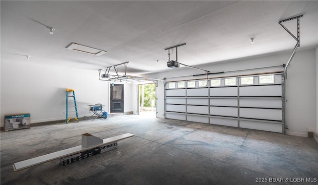 370 Via Appia Dr, Sunrise Beach, MO 65079 - garage featuring a garage door opener