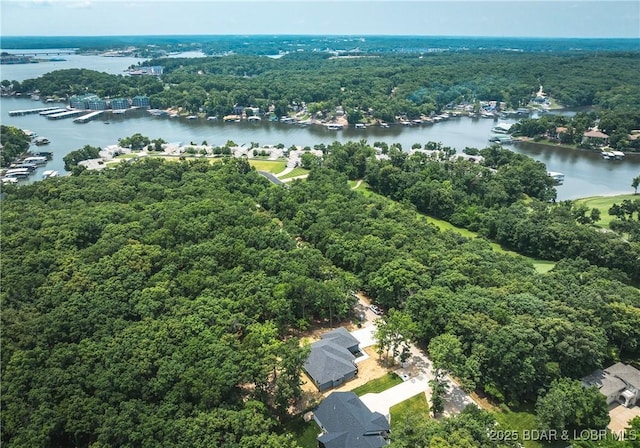 370 Via Appia Dr, Sunrise Beach, MO 65079 - aerial view of a large body of water and a heavily wooded area