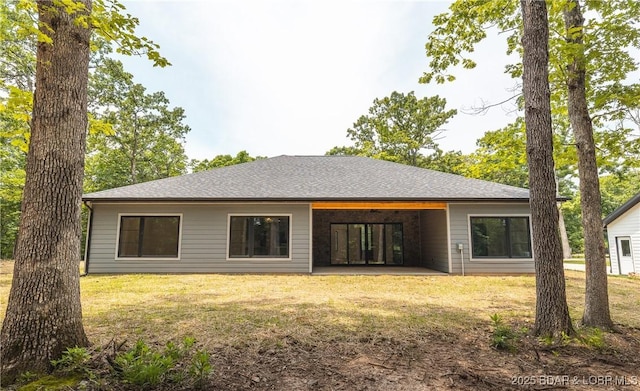 370 Via Appia Dr, Sunrise Beach, MO 65079 - rear view of property with a patio area and a lawn