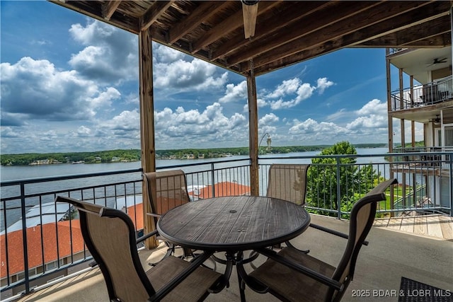 72 Palisades Lake View Dr Unit 2B, Lake Ozark, MO 65049 - balcony with a water view, a ceiling fan, and a sunroom