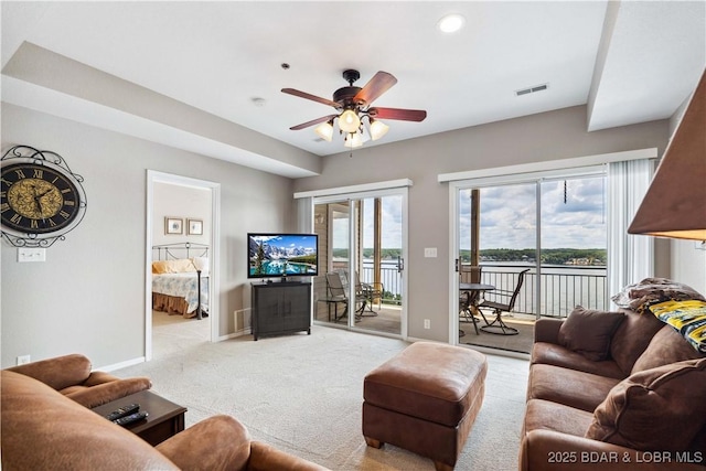 72 Palisades Lake View Dr Unit 2B, Lake Ozark, MO 65049 - living area with light carpet, a ceiling fan, and recessed lighting