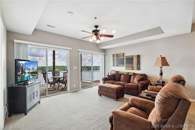 72 Palisades Lake View Dr Unit 2B, Lake Ozark, MO 65049 - living room with light carpet and ceiling fan