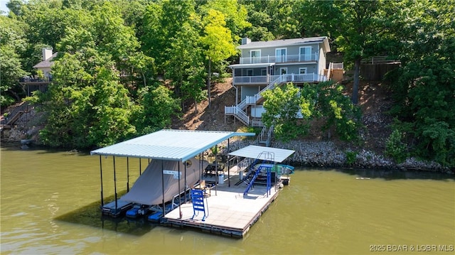 150 Trigger Rd, Linn Creek, MO 65052 - dock area with stairs, a water view, boat lift, and a balcony