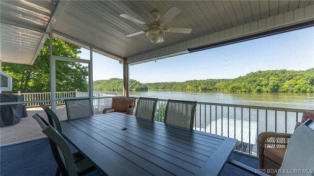 150 Trigger Rd, Linn Creek, MO 65052 - deck with a water view, a ceiling fan, grilling area, a wooded view, and outdoor dining area