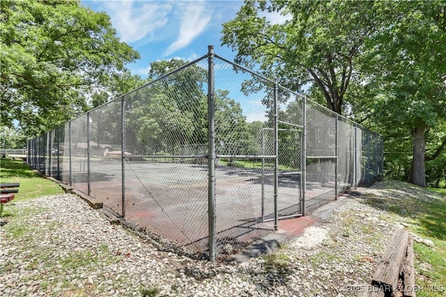 6620 Weston Point Dr Unit F4, Osage Beach, MO 65065 - view of tennis court featuring a gate
