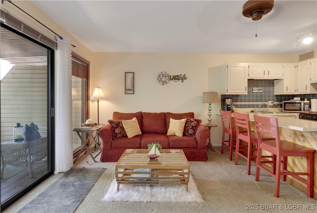 6620 Weston Point Dr Unit F4, Osage Beach, MO 65065 - living room with light carpet