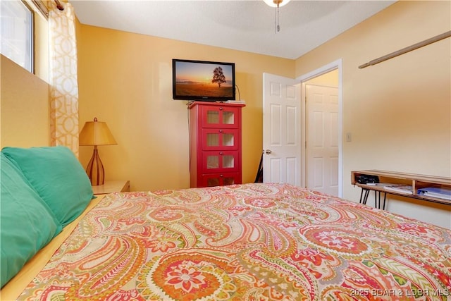 6620 Weston Point Dr Unit F4, Osage Beach, MO 65065 - bedroom with a ceiling fan