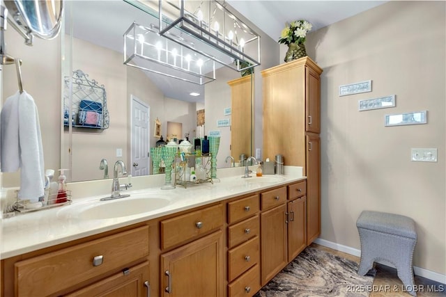 18132 Millstone Cove Rd Unit 334, Gravois Mills, MO 65037 - bathroom with double vanity and baseboards